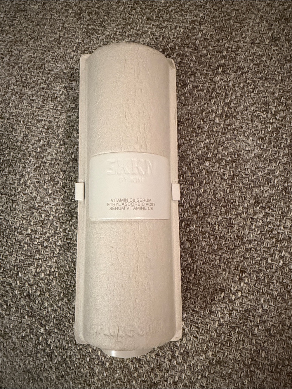 SKKN by Kim Vitamin C8 Serum — White Textured Cylinder Bottle